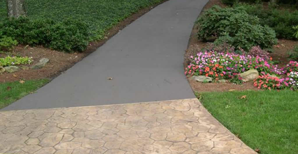 Driveway Resurfacing vs Replacement: Which One Fits Yours?